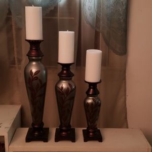 3 pcs. Tiered candle holders/candles.